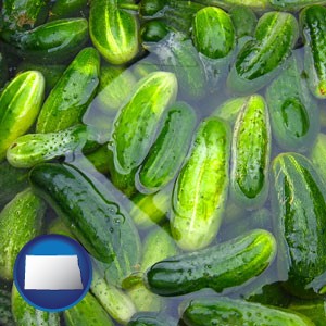 cucumber pickles processed in brine - with North Dakota icon